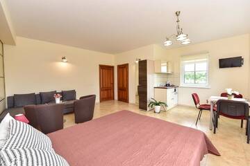 Фото номера Четырехместный номер с ванной комнатой Курортные отели Trakaitis Holiday Home г. Тракай 8