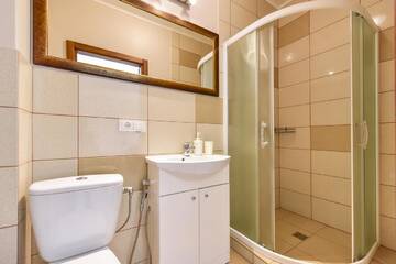 Фото номера Четырехместный номер с ванной комнатой Курортные отели Trakaitis Holiday Home г. Тракай 15