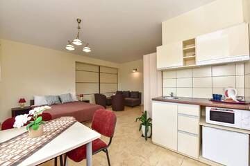 Фото номера Четырехместный номер с ванной комнатой Курортные отели Trakaitis Holiday Home г. Тракай 10