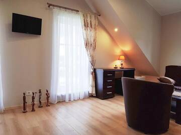 Фото номера Четырехместный номер с ванной комнатой Курортные отели Trakaitis Holiday Home г. Тракай 19